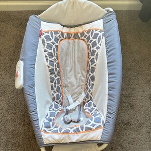 Gray and White Baby Rocker with Orange Accents